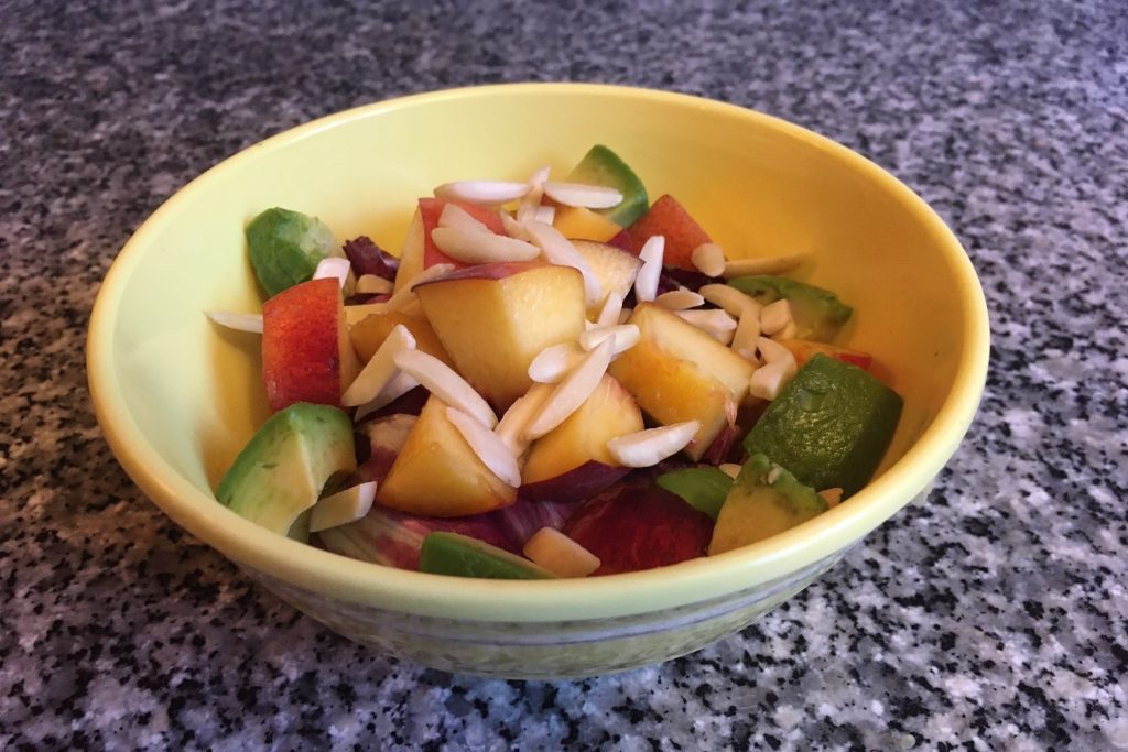 create your own grain bowl: quinoa with radicchio, avocados, peaches, and slivered almonds
