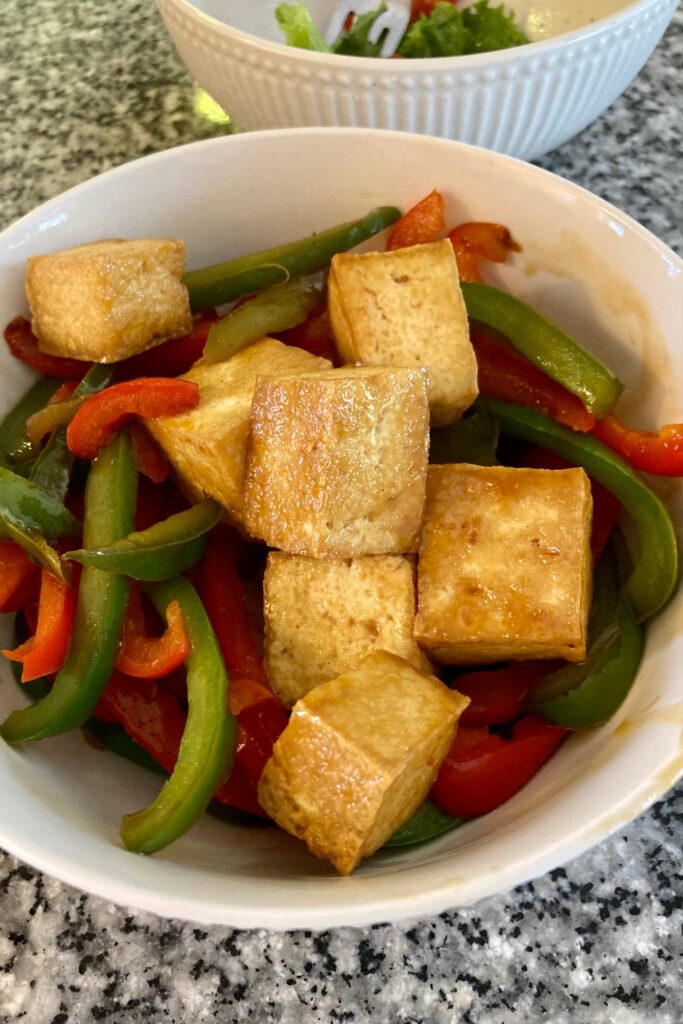 gluten free tofu teriyaki with green and red peppers